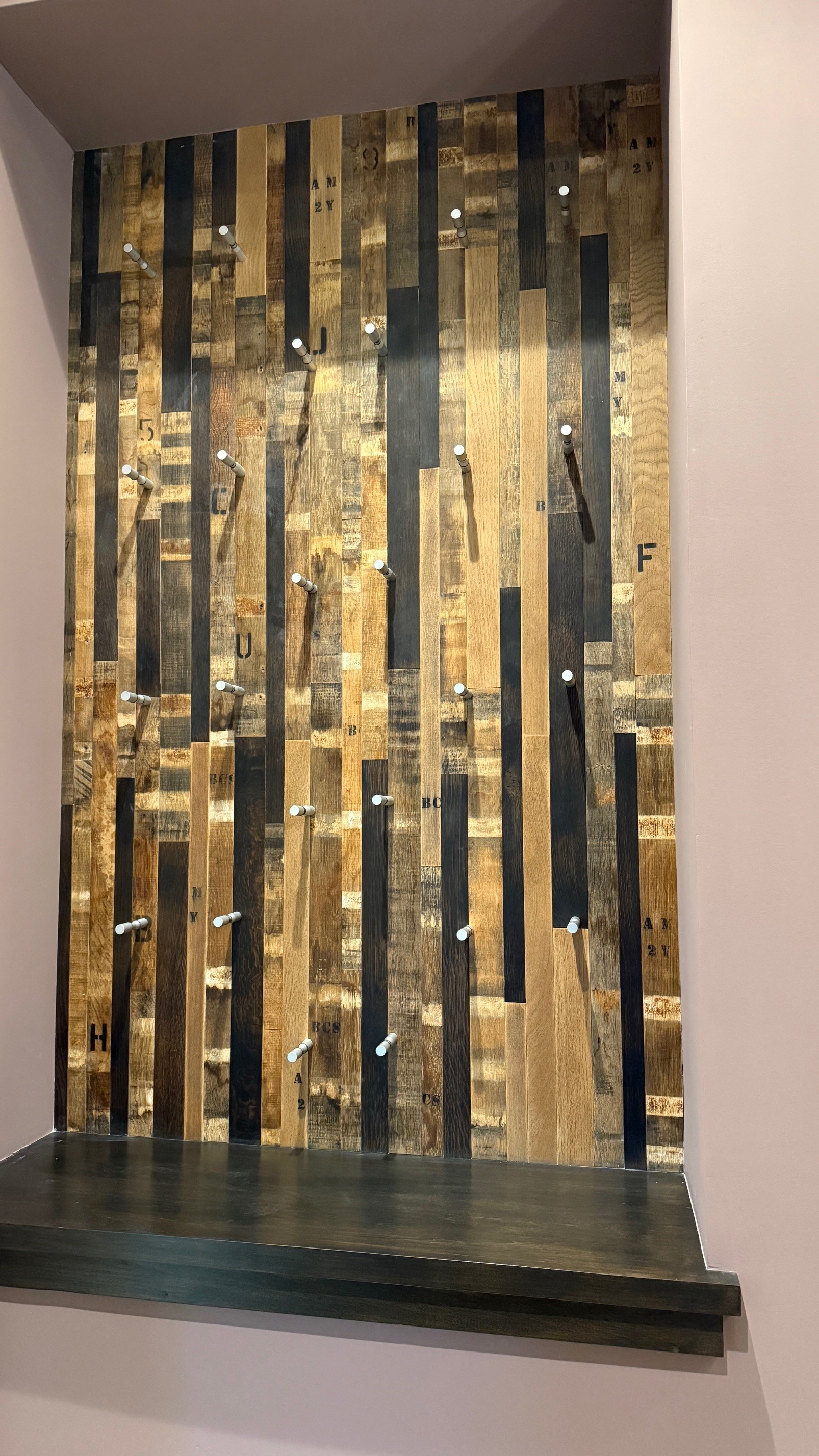 Wine pegs holding bottles horizontally